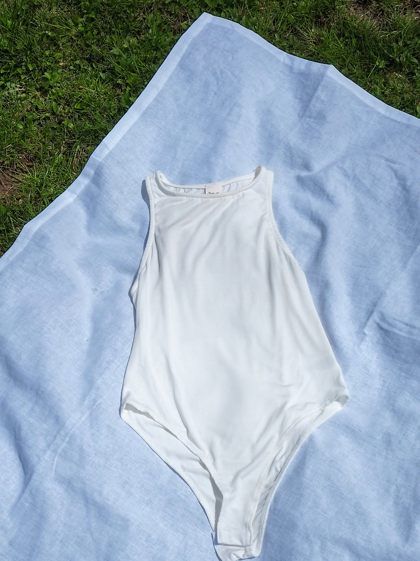 flatlay image of bodysuit