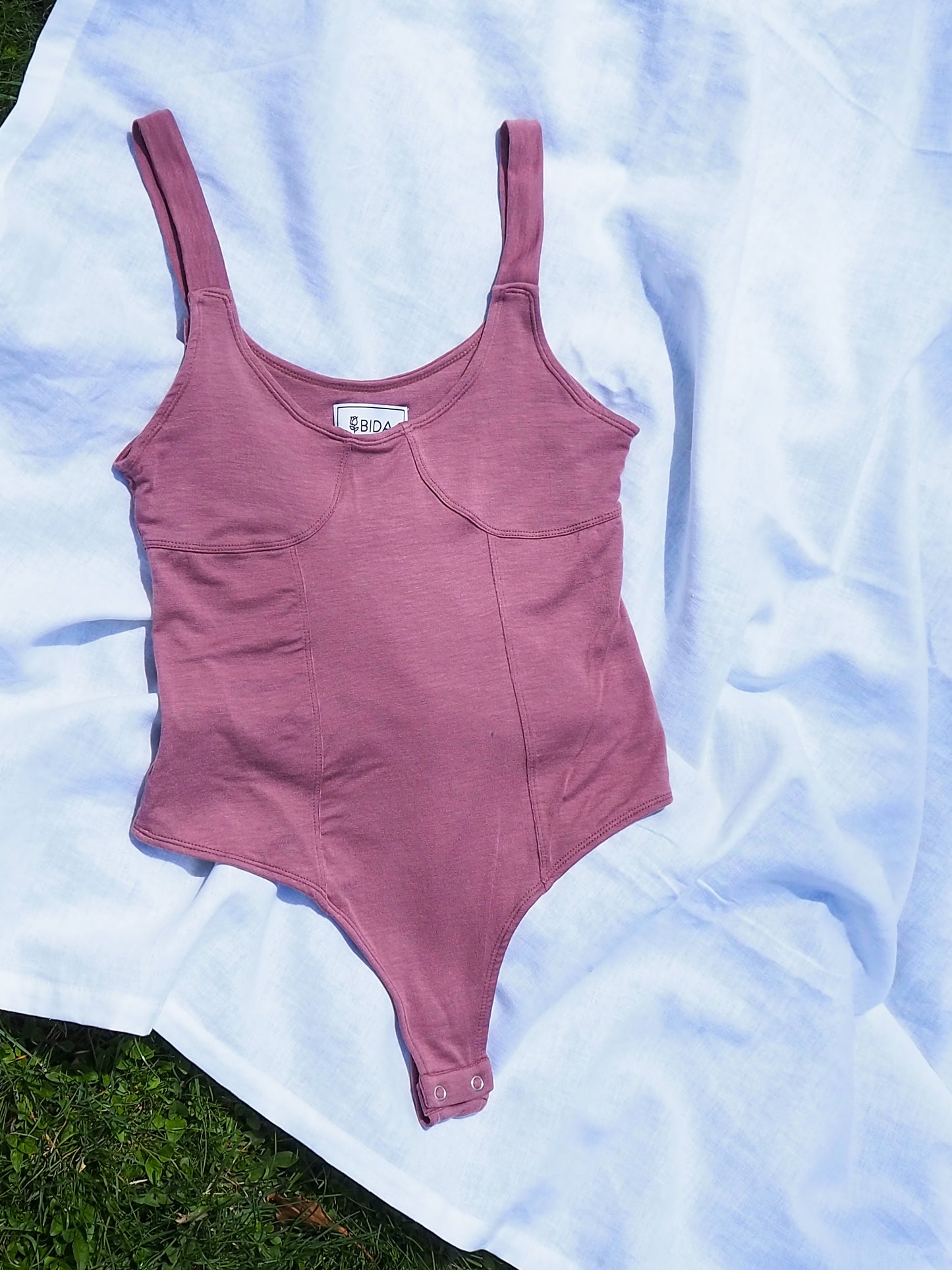 flatlay image of bodysuit