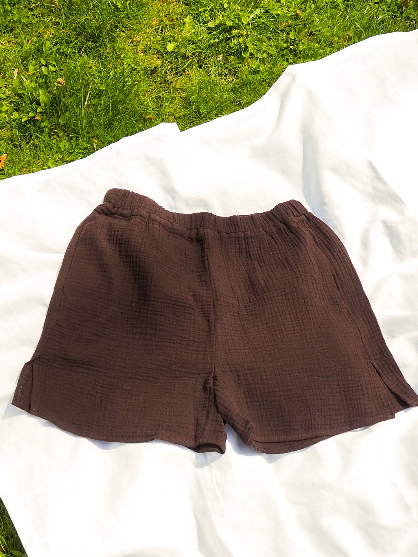 image of model wearing double gauze side slit shorts