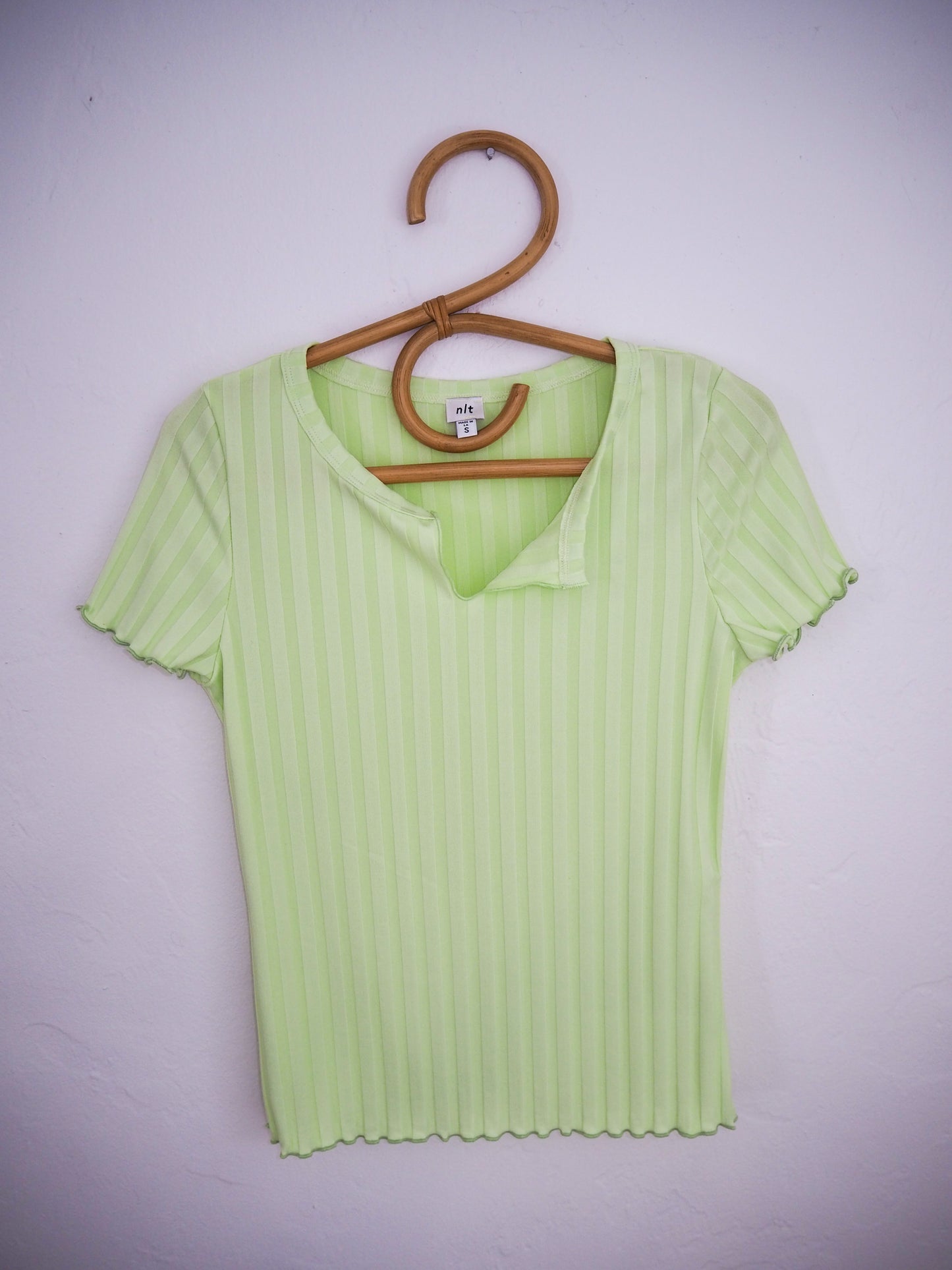 image of scully top on hanger
