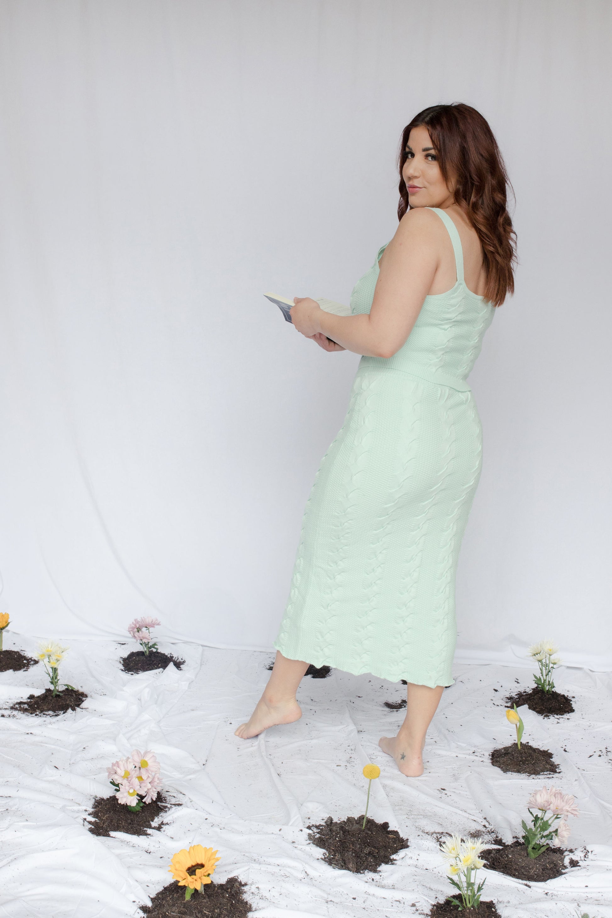 Image of model in bergamot knit set