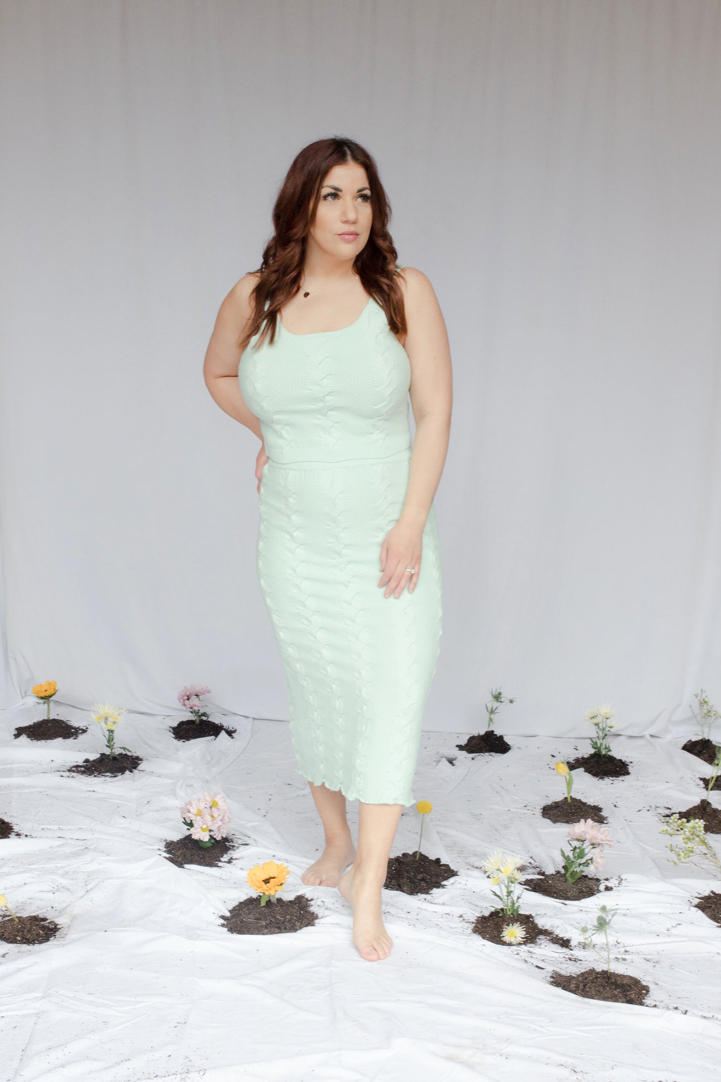 Image of model in bergamot knit set