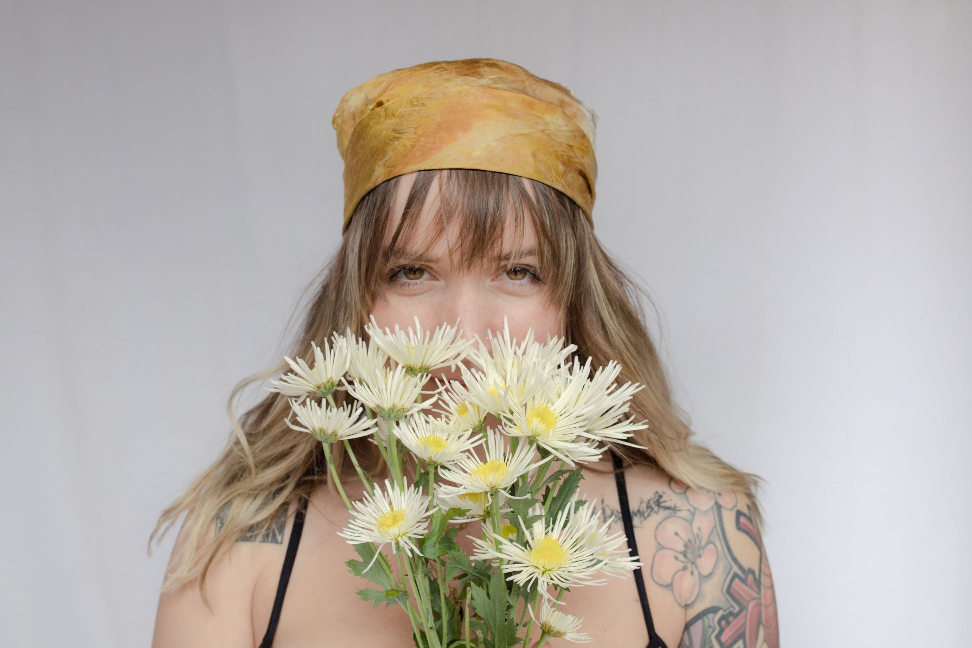 image of model wearing natural dye silk bandana