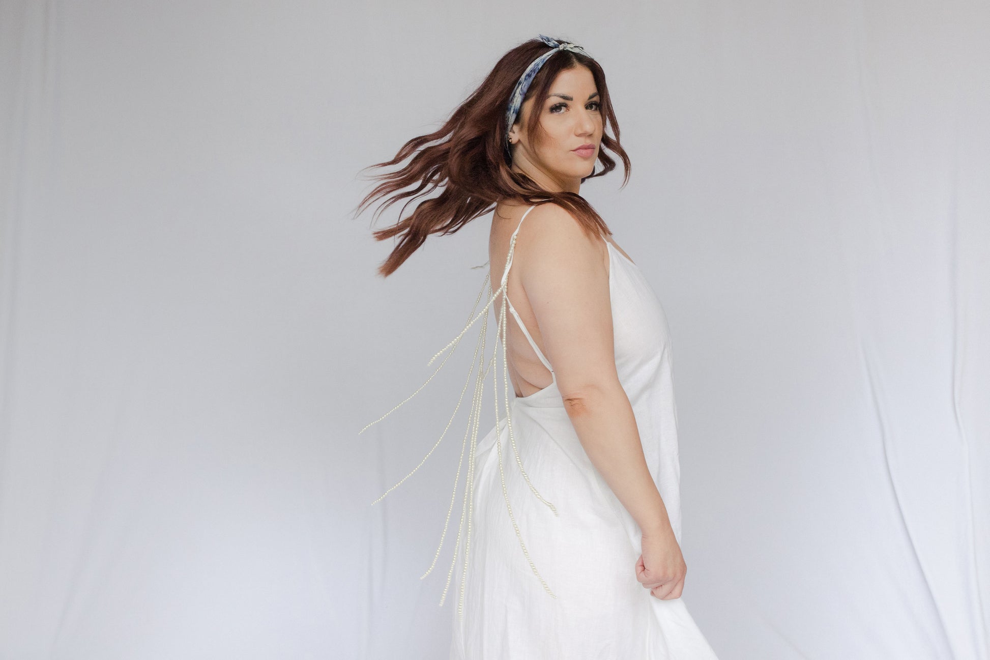 image of model wearing natural dye silk bandana 