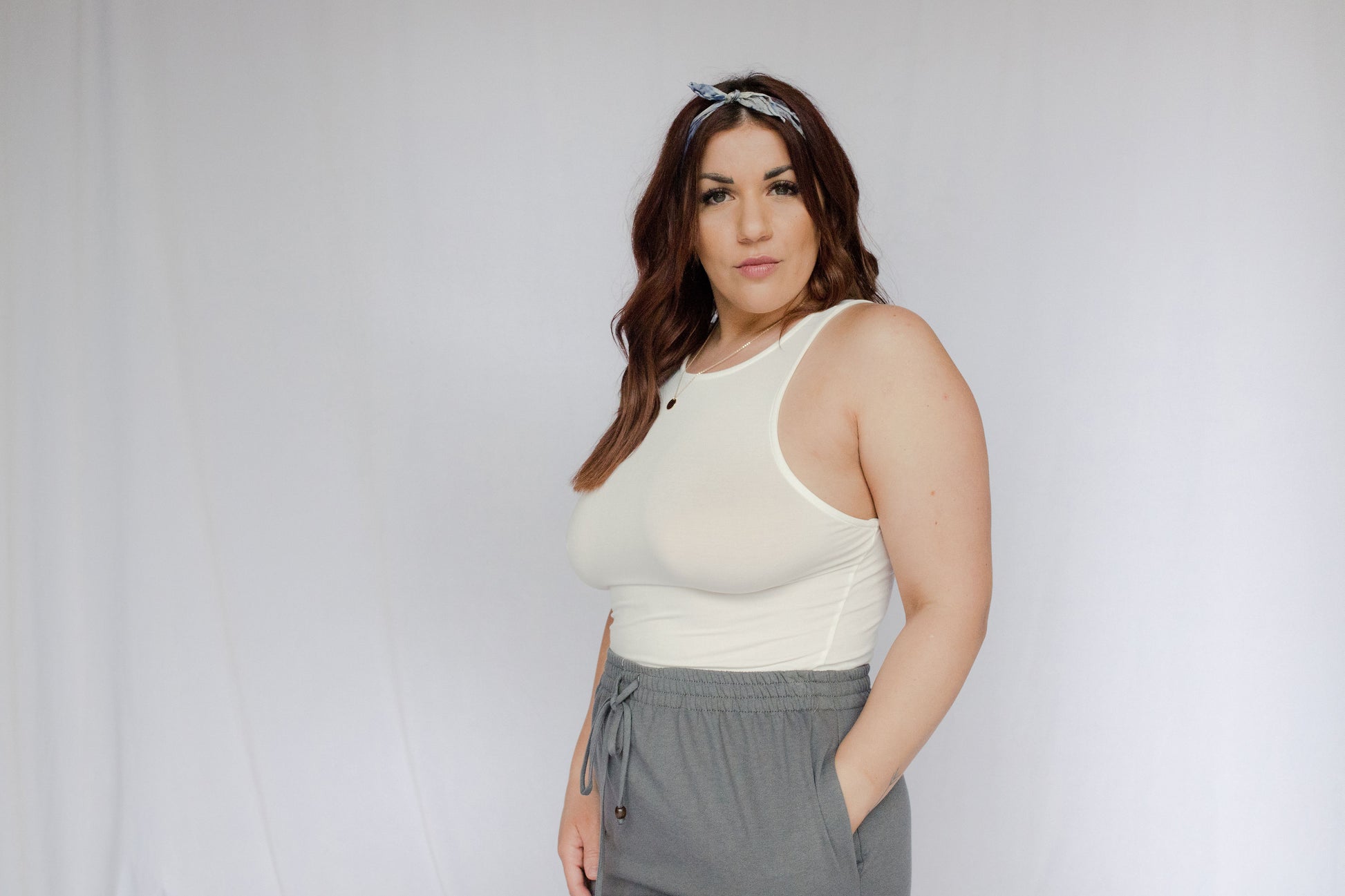 image of model wearing natural dye silk bandana 