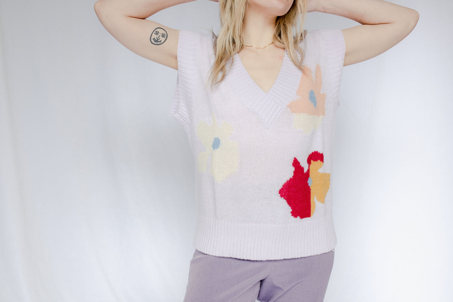 image of model wearing bloom knit vest