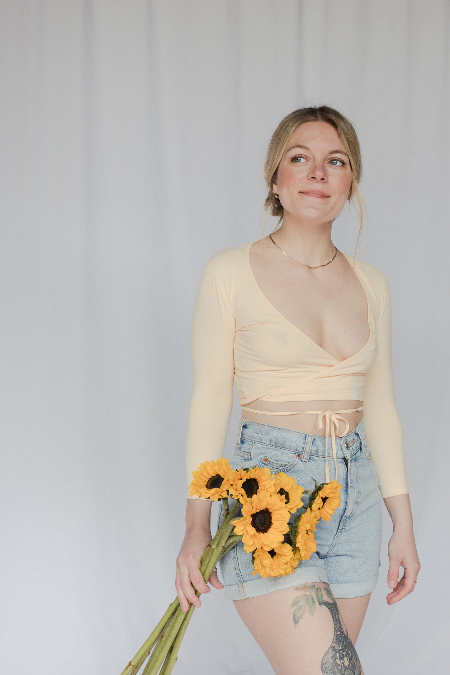 image of model in sia wrap top