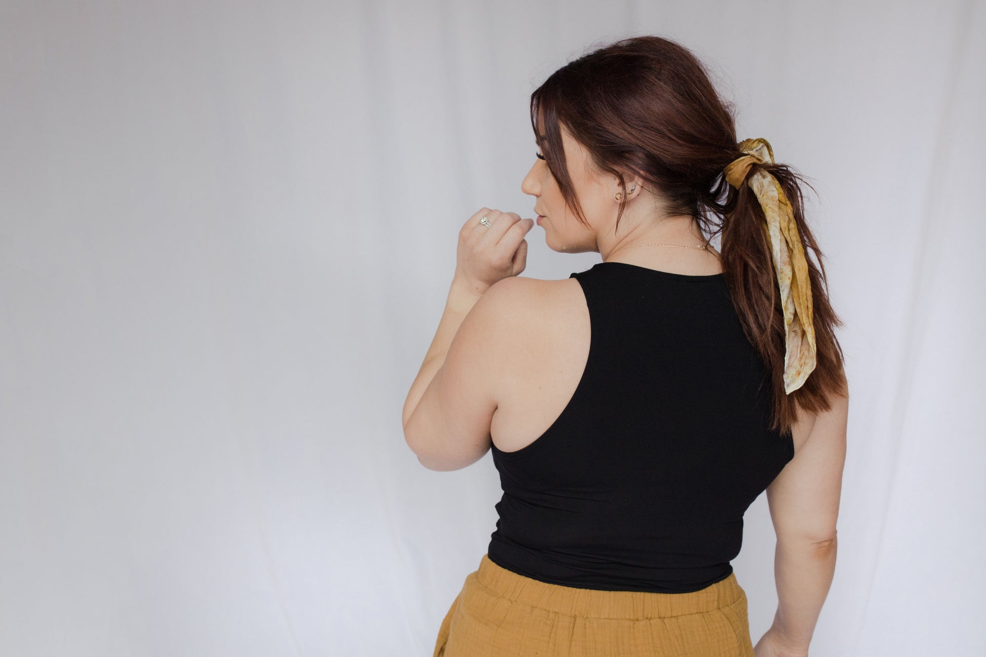 image of model wearing natural dye silk bandana