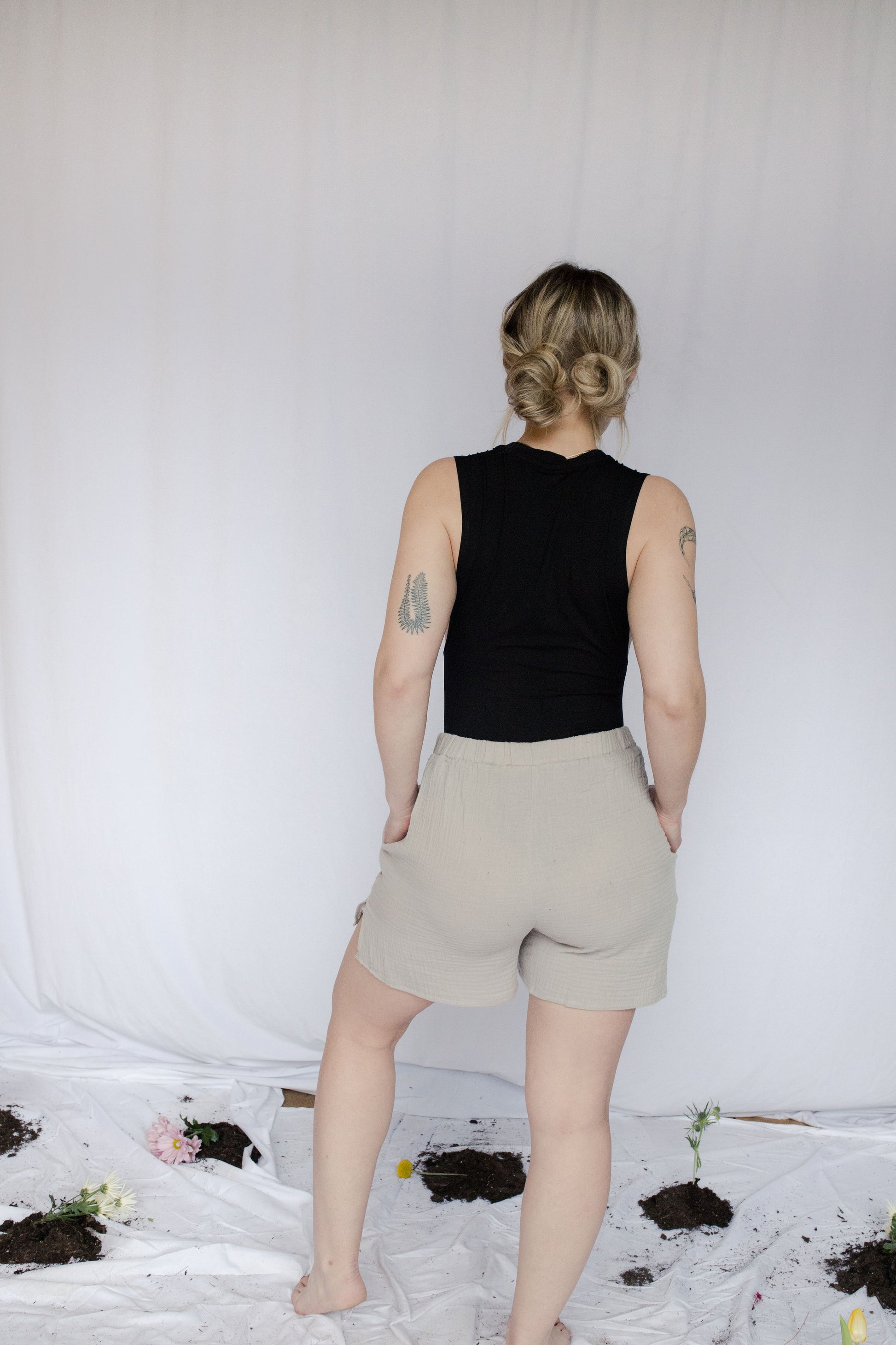 Image of model wearing bamboo muscle tank bodysuit