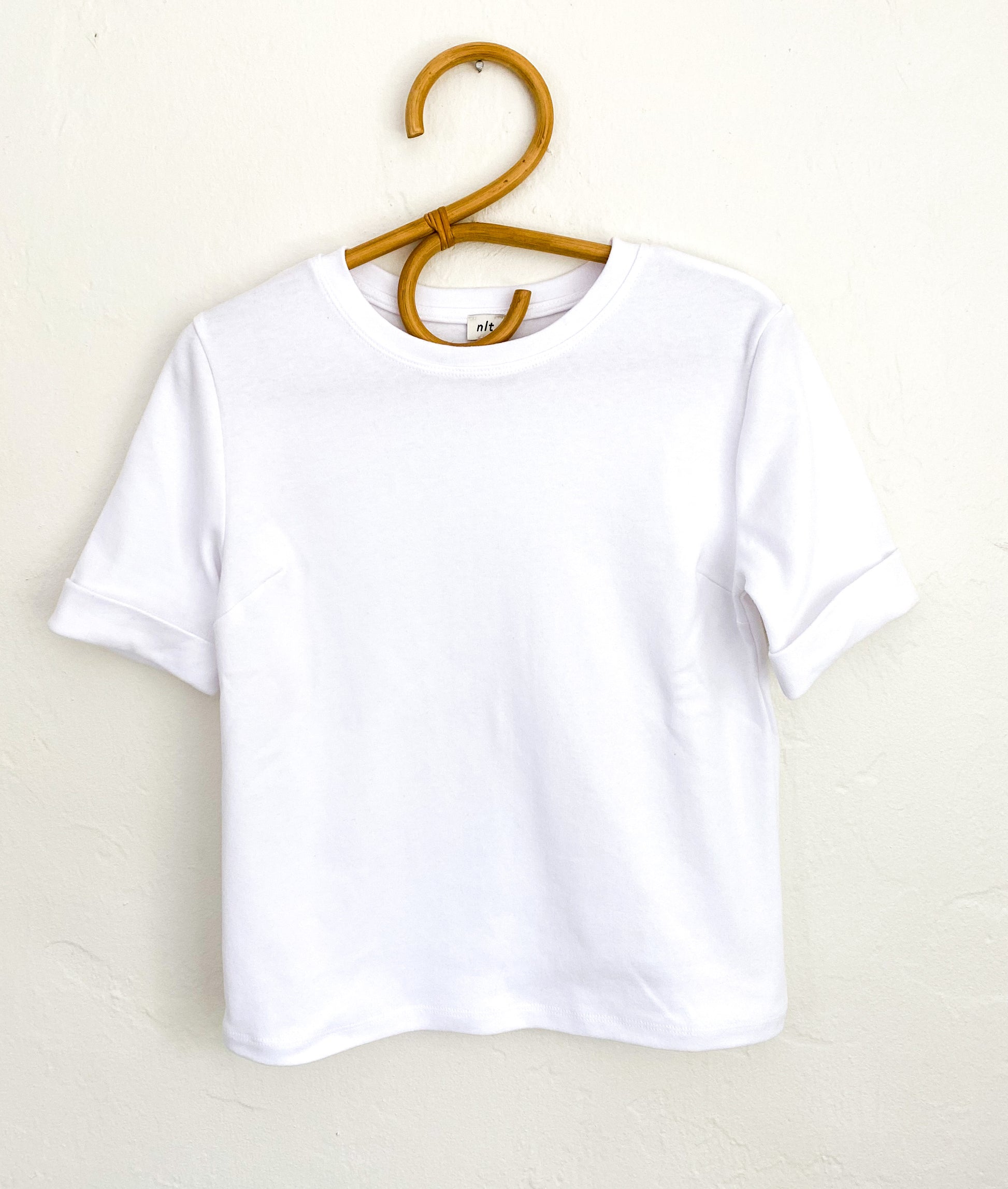 image of rita tee on hanger