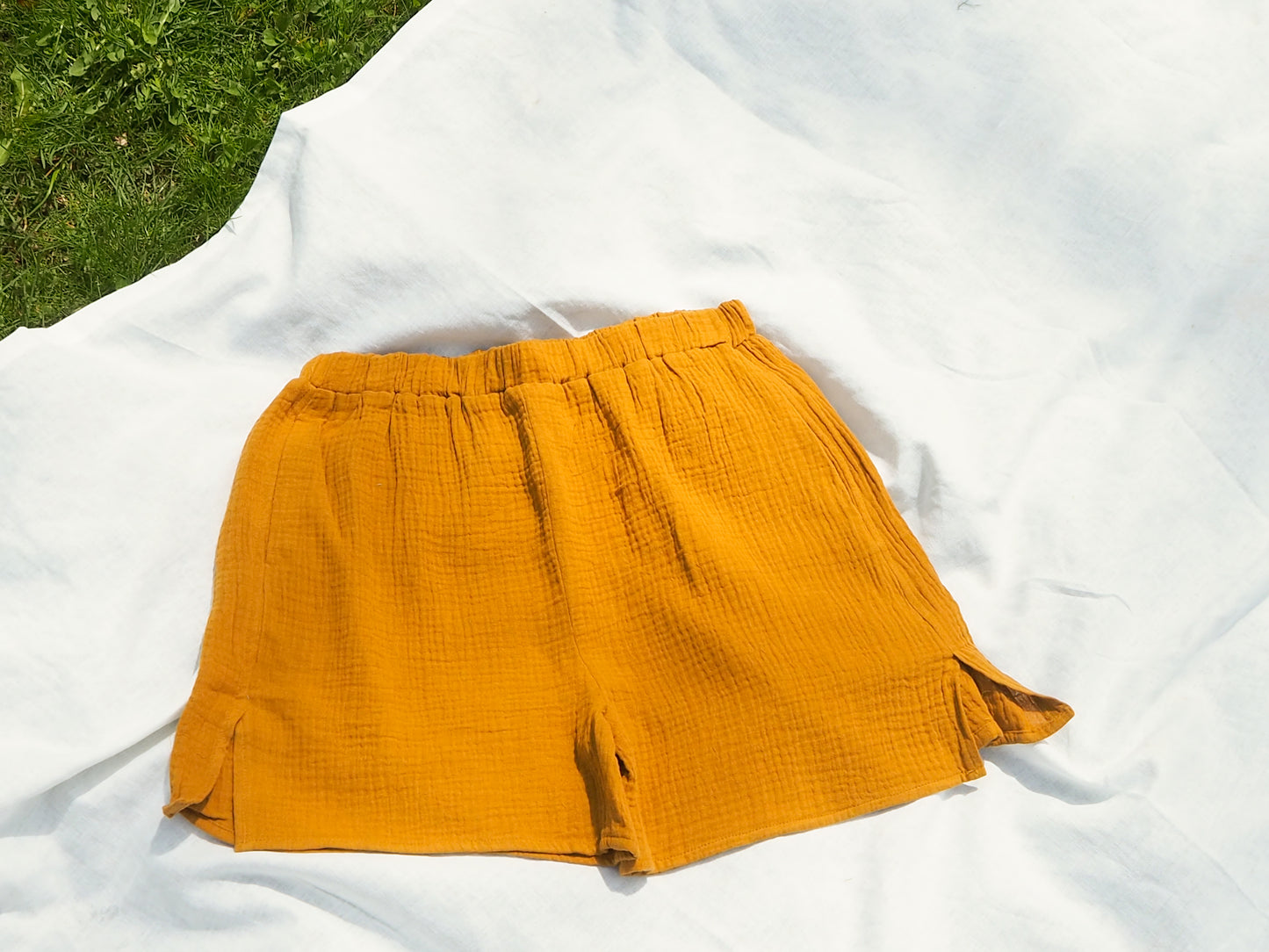 flatlay image of double gauze side slit shorts