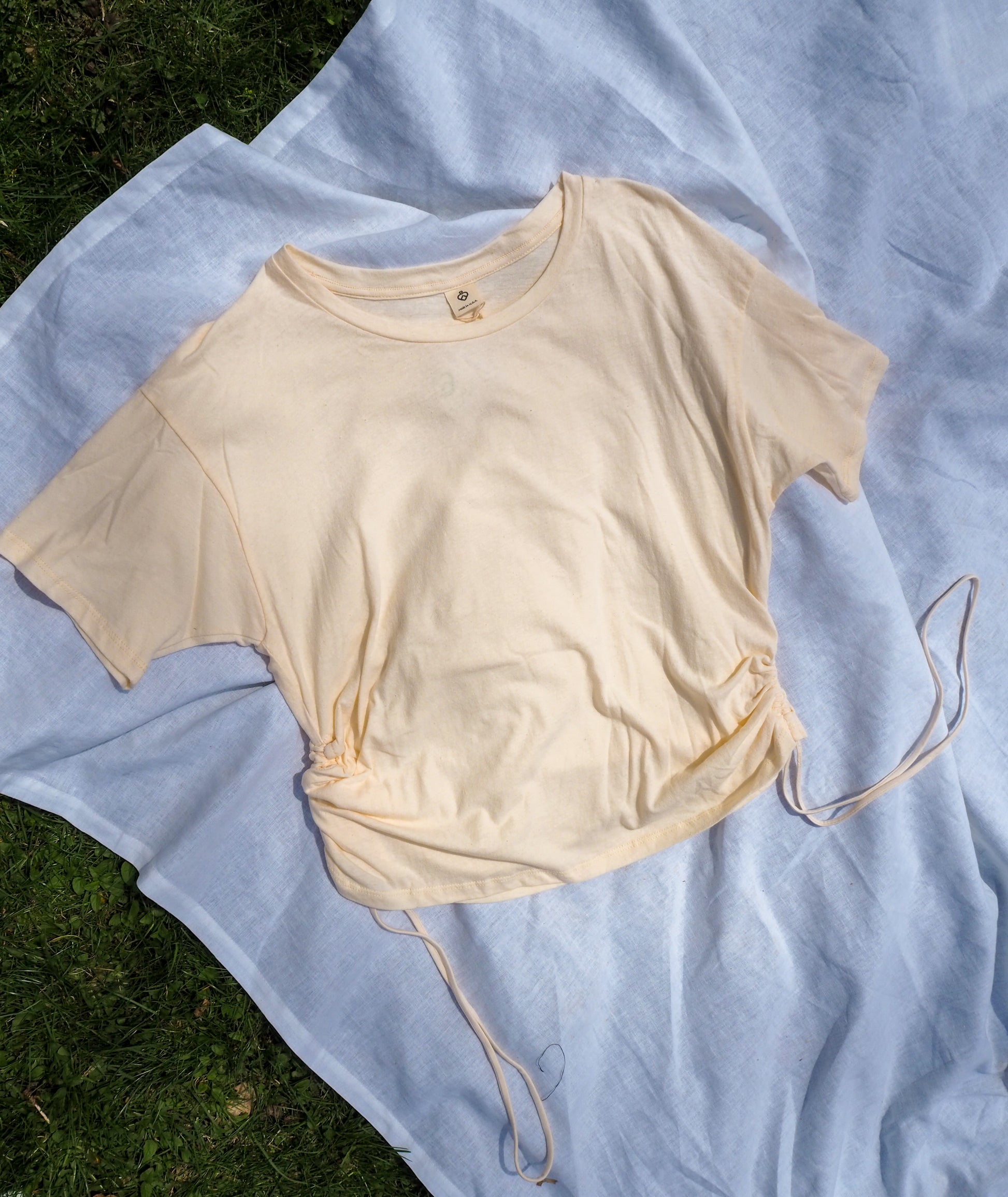Flatlay image of side fun top