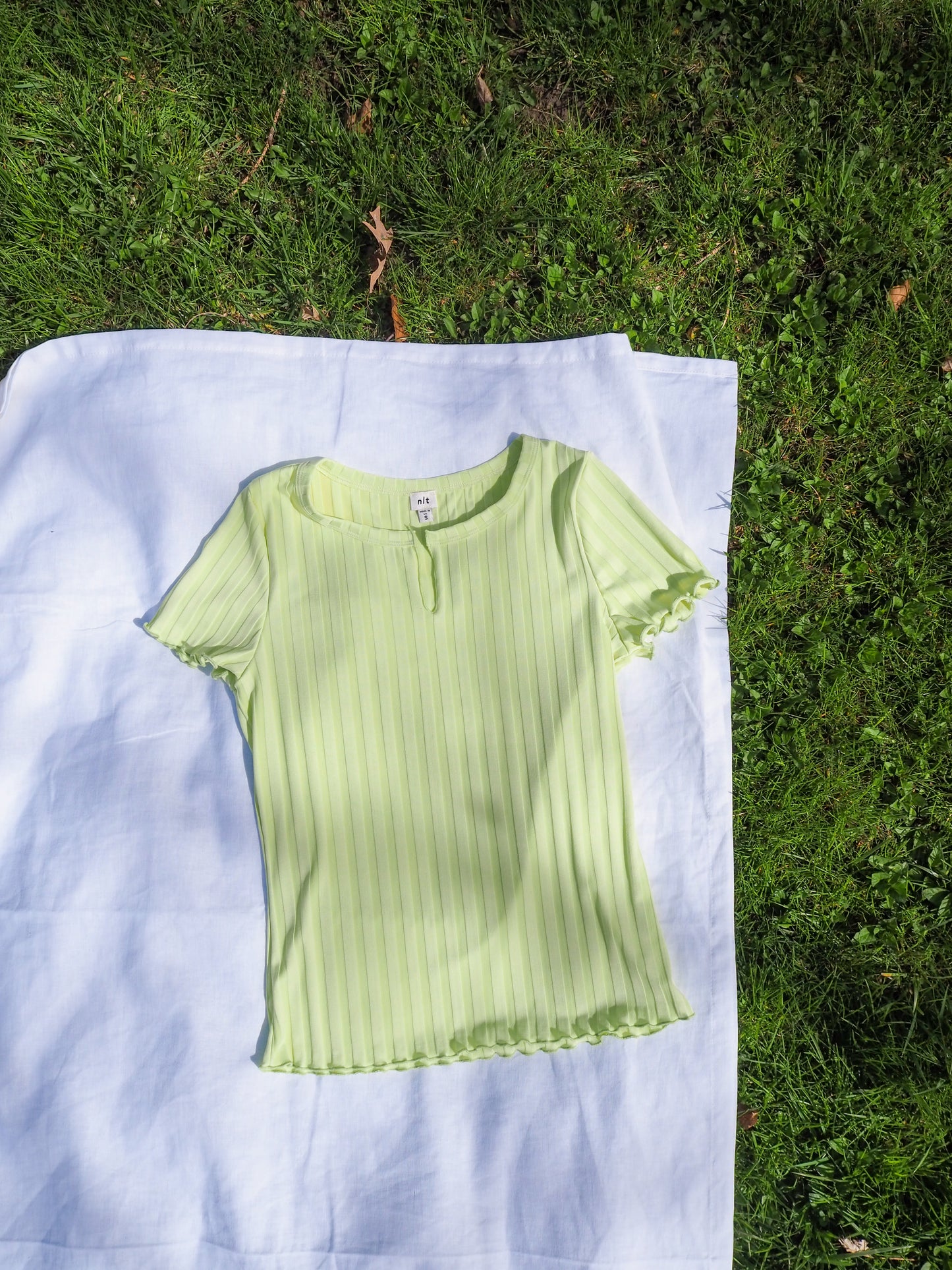 image of flatlay scully top